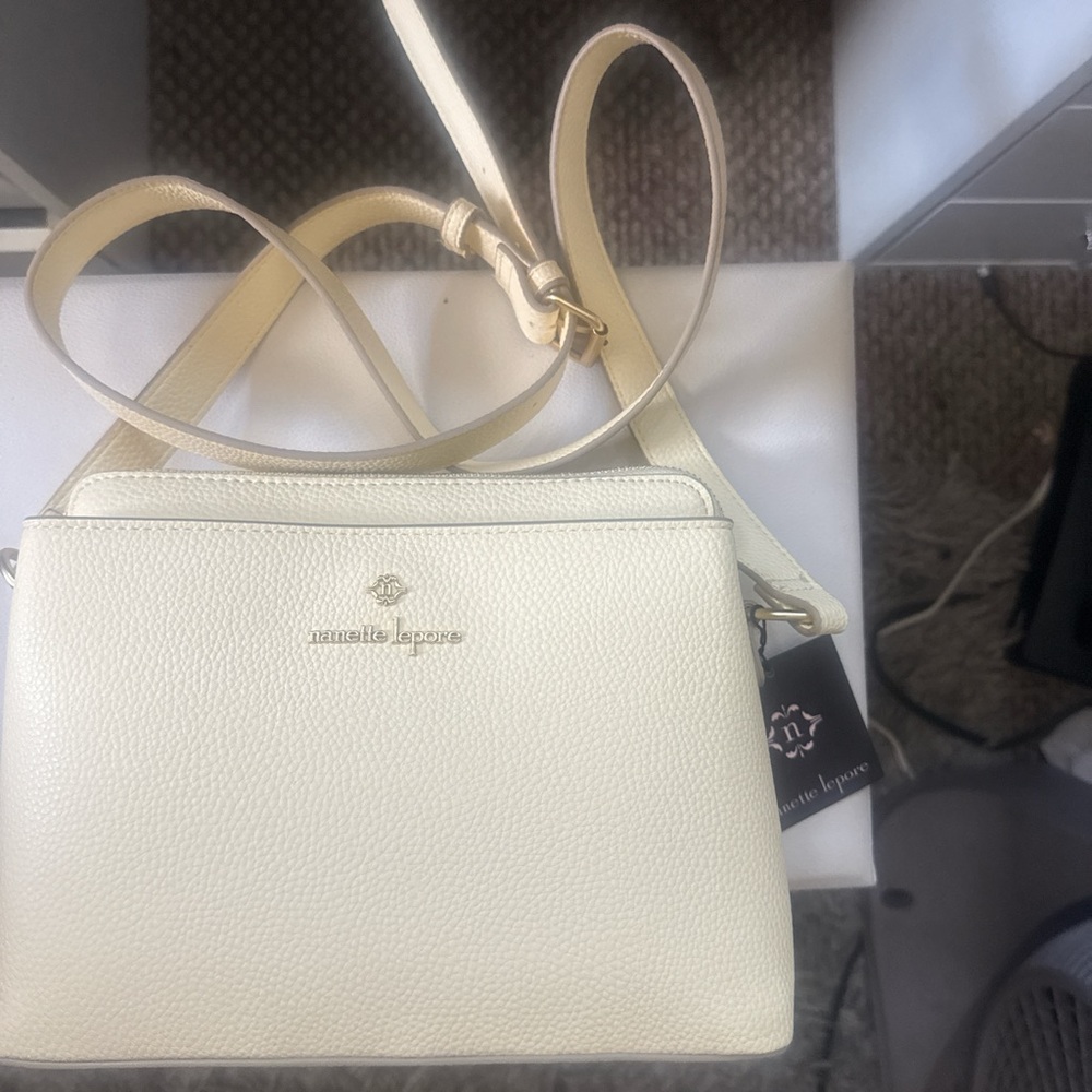 Nanette Lepore Cream Crossbody Bag with Minimalist Elegance